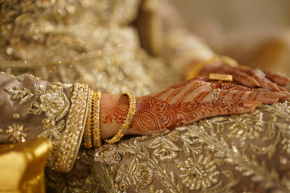 Henna and gold bangles